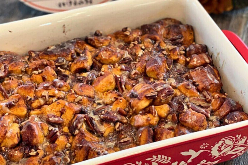 A casserole of cinnamon rolls and pumpkin with nuts.