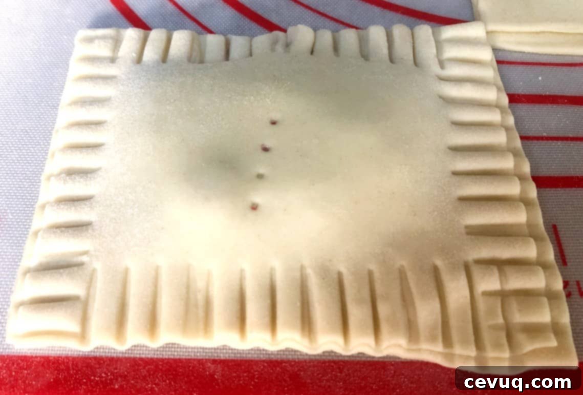 Ποπ Ταρτς στη Φριτέζα Αέρος 8 puff pastry shaped into a pop tart.
