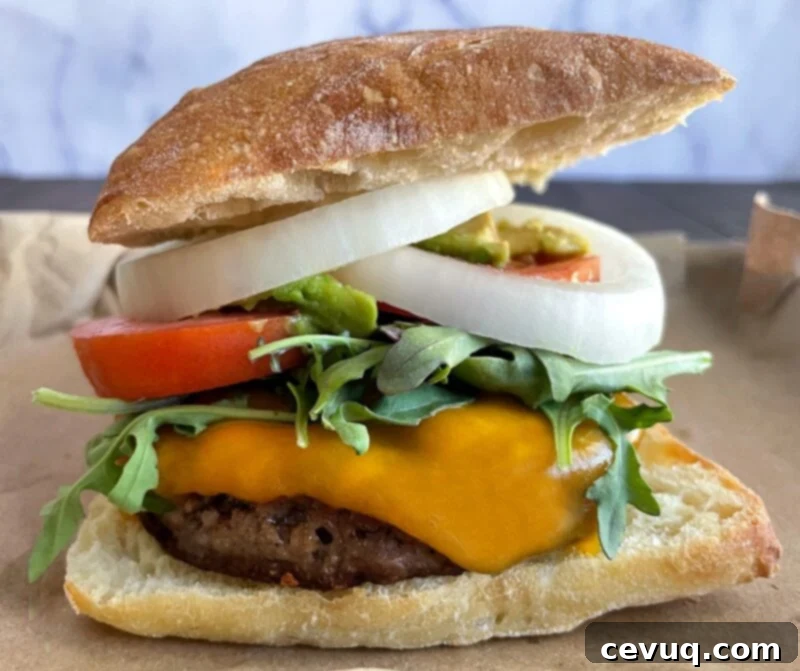 Εύκολα Ψωμάκια Τσιαπάτα 11 homemade ciabatta bread with an impossible burger and toppings.