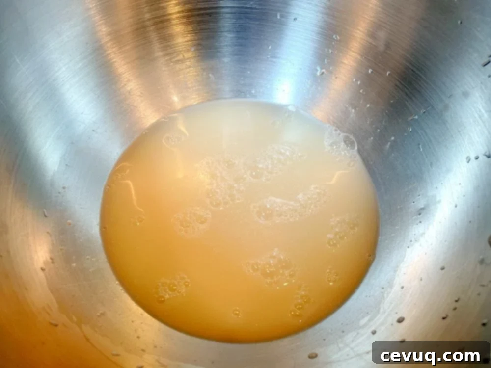 Εύκολα Ψωμάκια Τσιαπάτα 5 yeast and water in a bowl.