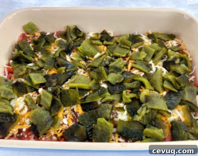 Πιπερότυρο Ντιπ 3 roasted chiles in pan for relleno dip