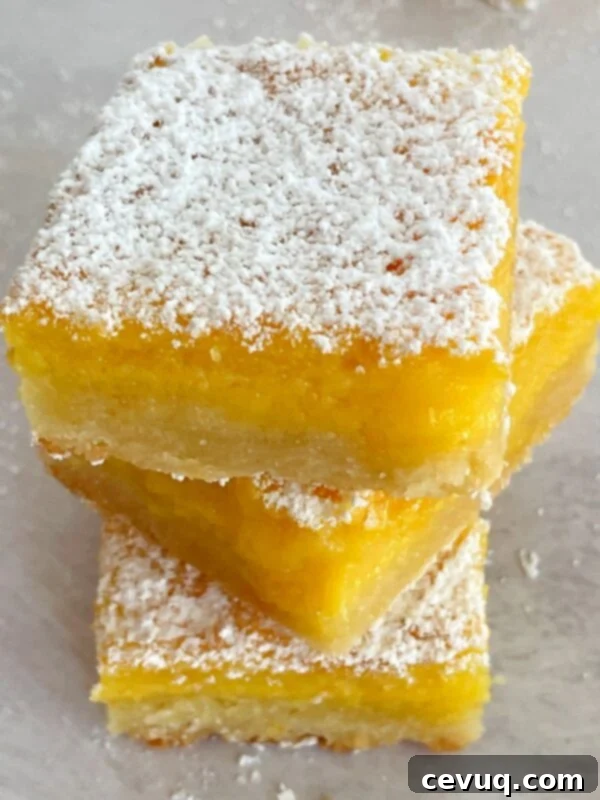 Εύκολες Μπάρες Μαρικούγιας 7 stack of passion fruit bars.