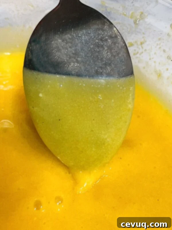 Γρήγορη Κρέμα Φρούτου του Πάθους 11 curd φρούτου του πάθους καλύπτοντας το πίσω μέρος ενός κουταλιού