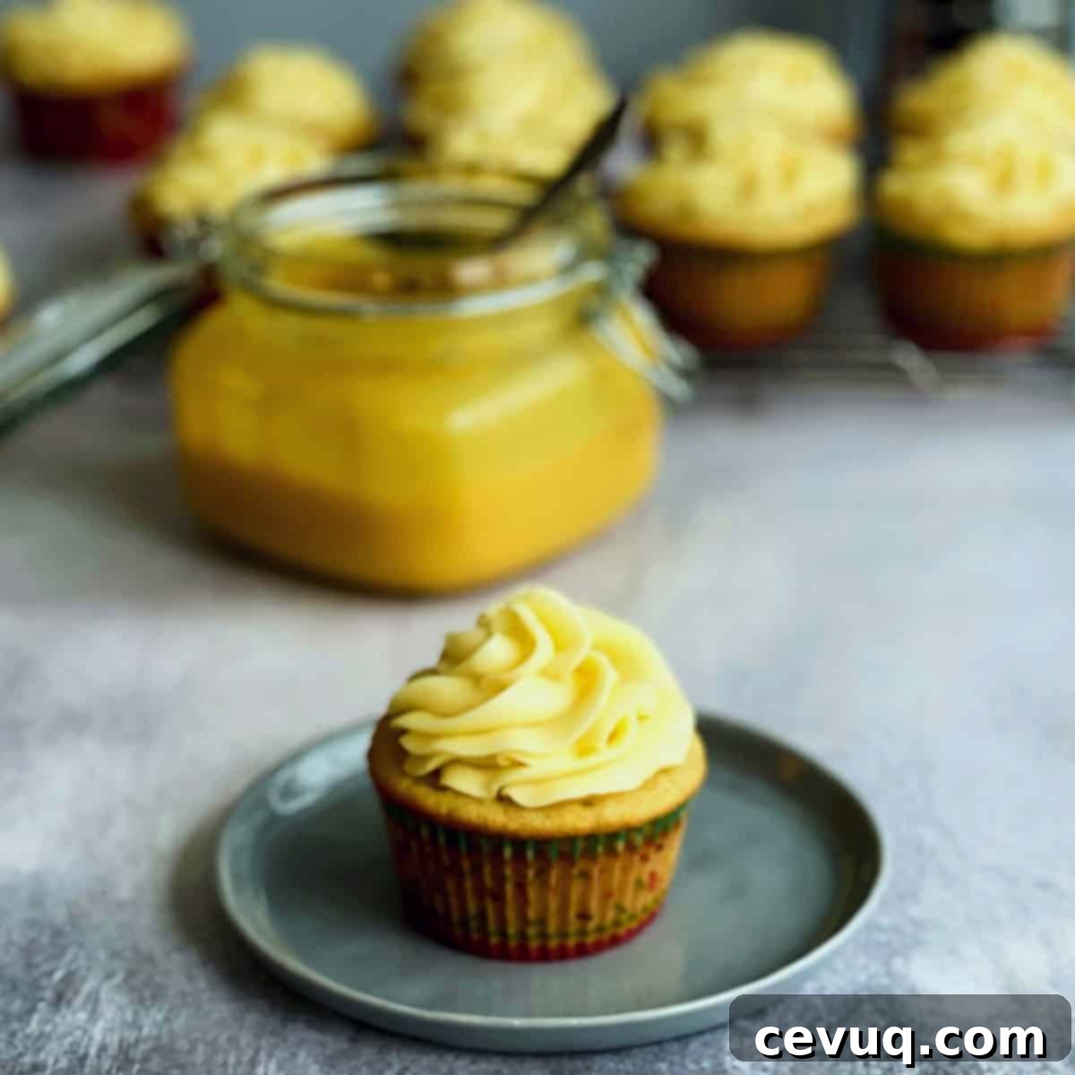 Κάπκεϊκ φρούτου του πάθους 2 cupcakes φρούτου του πάθους με κρέμα