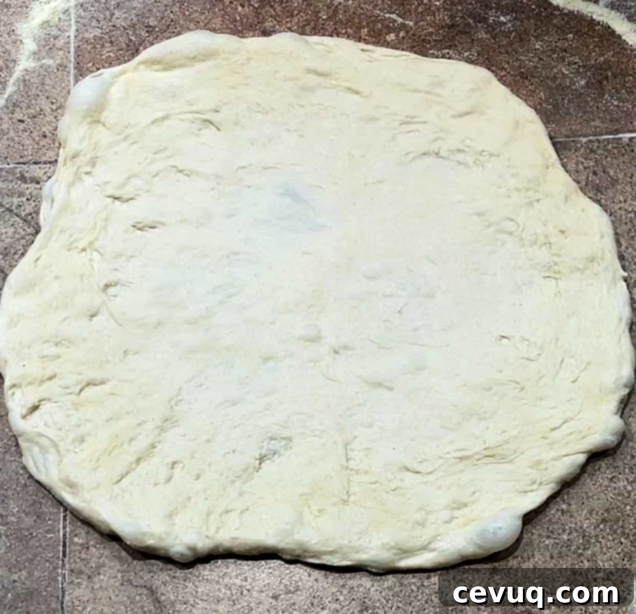 Πουλις Ζύμη Πίτσας 10 Ζύμη πίτσας poolish απλωμένη.