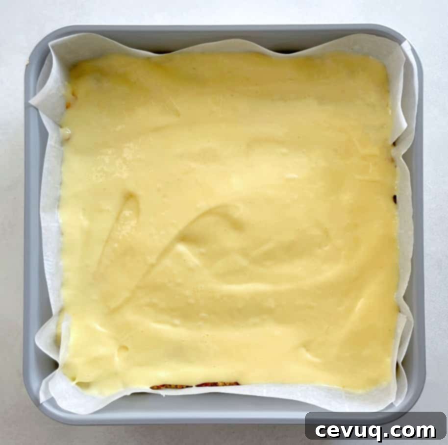 Μπάρες Τσιζκέικ με Κράμπλ Μήλου 8 Στρώση cheesecake για μπάρες cheesecake μήλου.