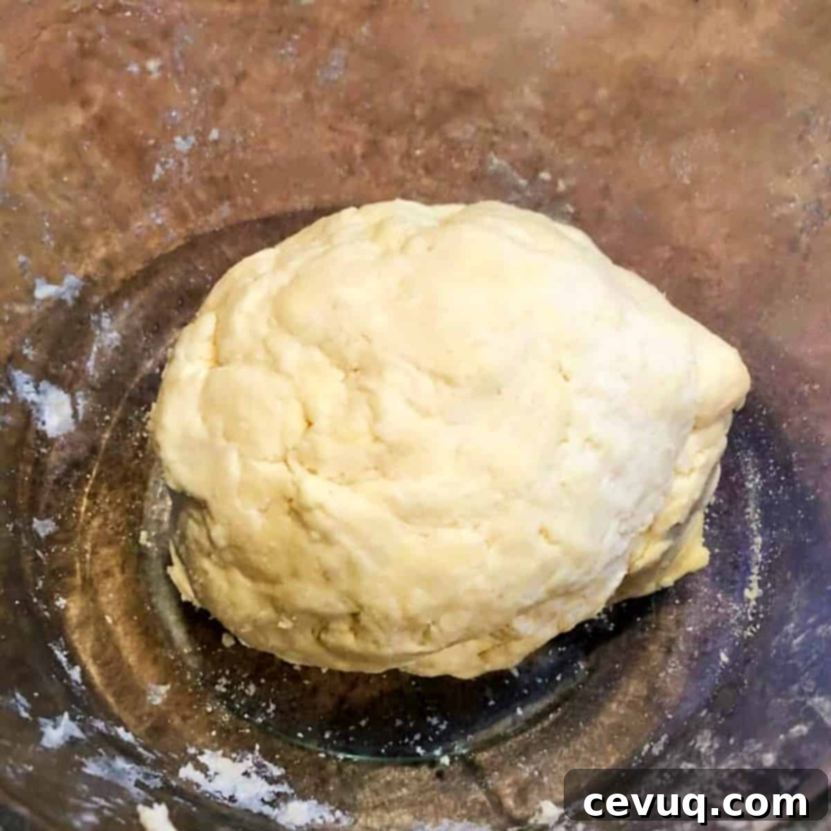 Γρήγορη και Εύκολη Σφολιάτα 7 ball of puff pastry dough.