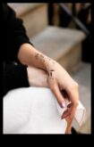 Elegant Whispers The Subtle Beauty of Wrist Tattoos