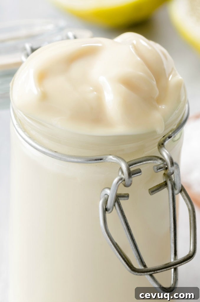 Close up of a jar of fresh homemade mayo as a condiment dressing for salads and sandwiches
