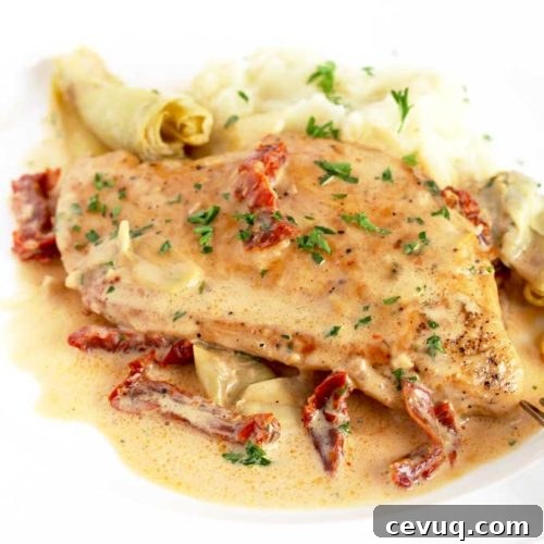 Creamy Sun-Dried Tomato Chicken with Garlic and Herbs 9 Creamy Chicken pan seared and served with a creamy artichoke and sun dried tomato sauce.