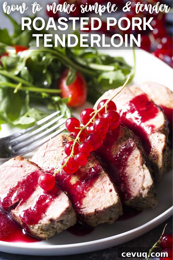 Sliced pork and currant sauce on a black plate with text overlay - Roasted Pork Tenderloin.