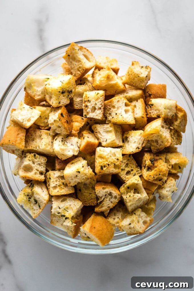 Close-up of crunchy croutons in a prep bowl.