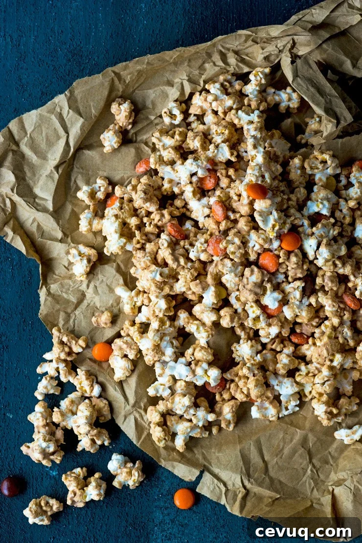 All the flavor of your favorite peanut butter cup wrapped around crunchy popcorn! This Peanut Butter Popcorn is for you, Reese's Lovers! 