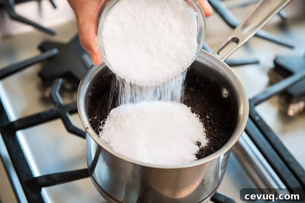 Adding Sweetener to pot with tea and water