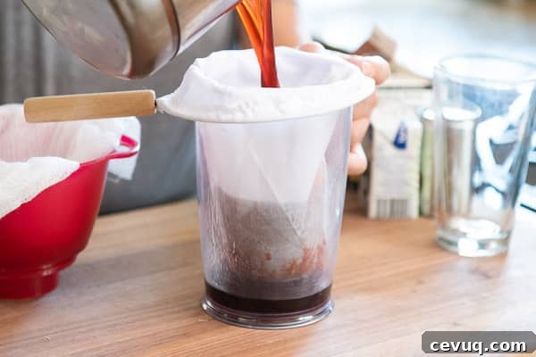 Straining tea through reusable cloth filter