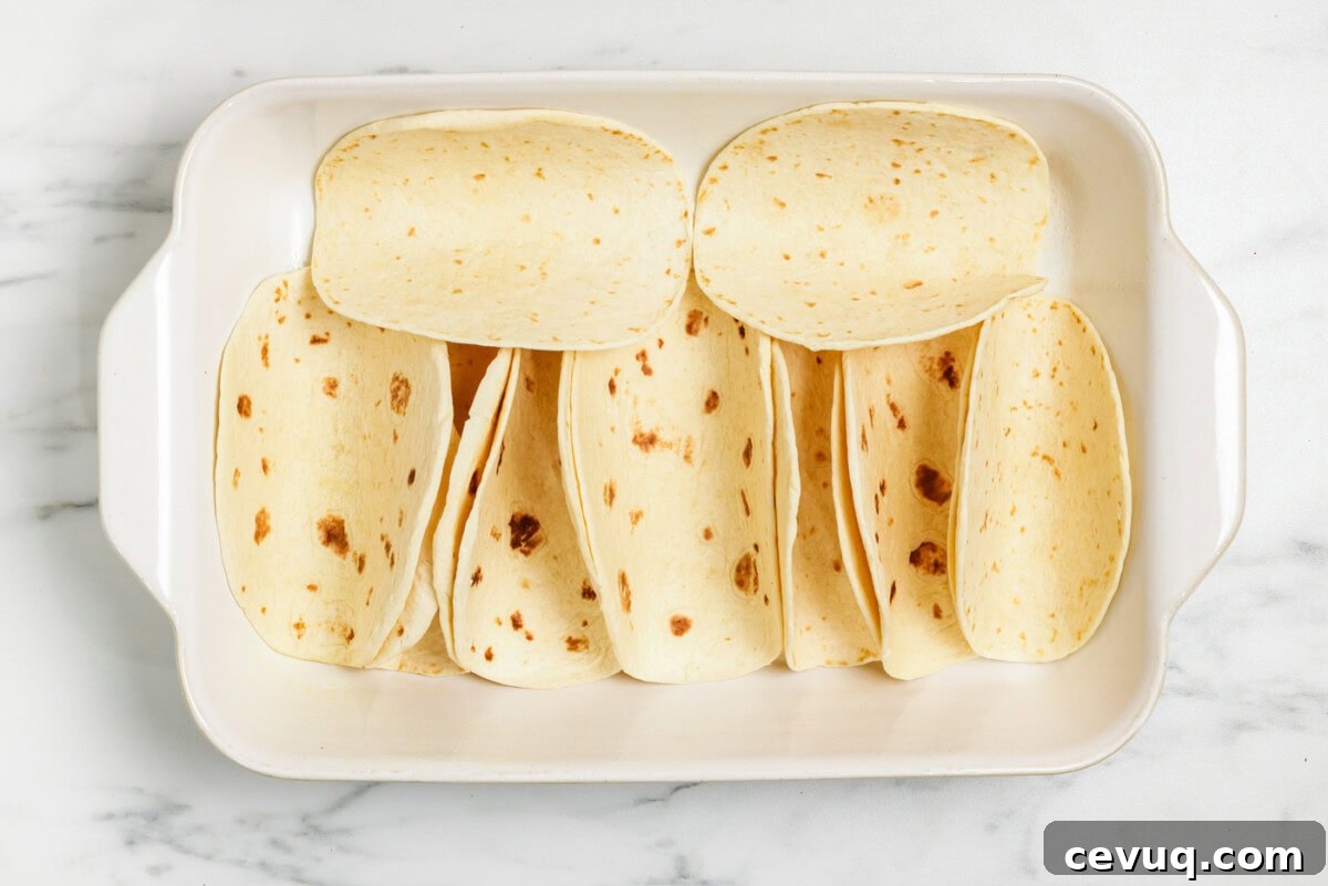 flour tortillas in a 13x9 pan