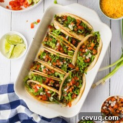 overhead photo of oven tacos in pan