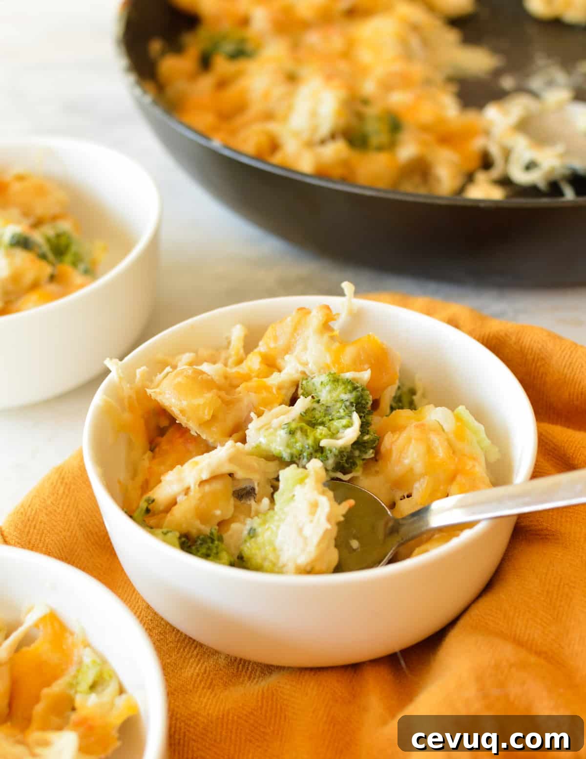 One-Pan Chicken and Broccoli Pasta Bake for Quick Dinners 6 a bowl of chicken, broccoli, and cheesy pasta