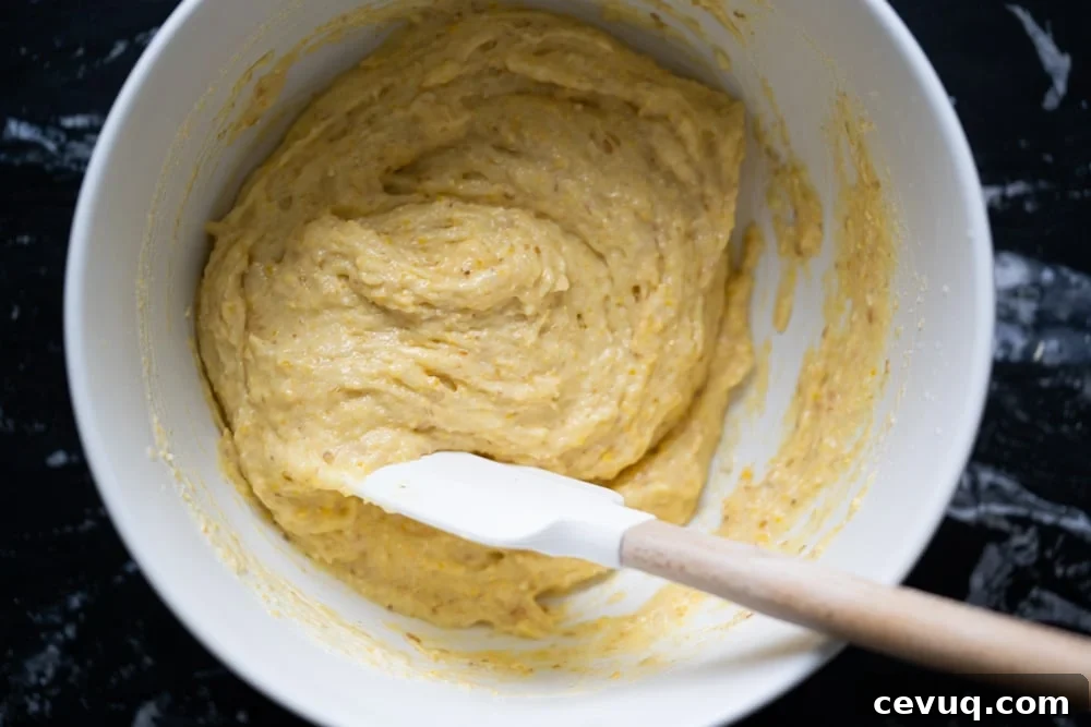 Low carb cornbread batter made with actual cornmeal in a bowl