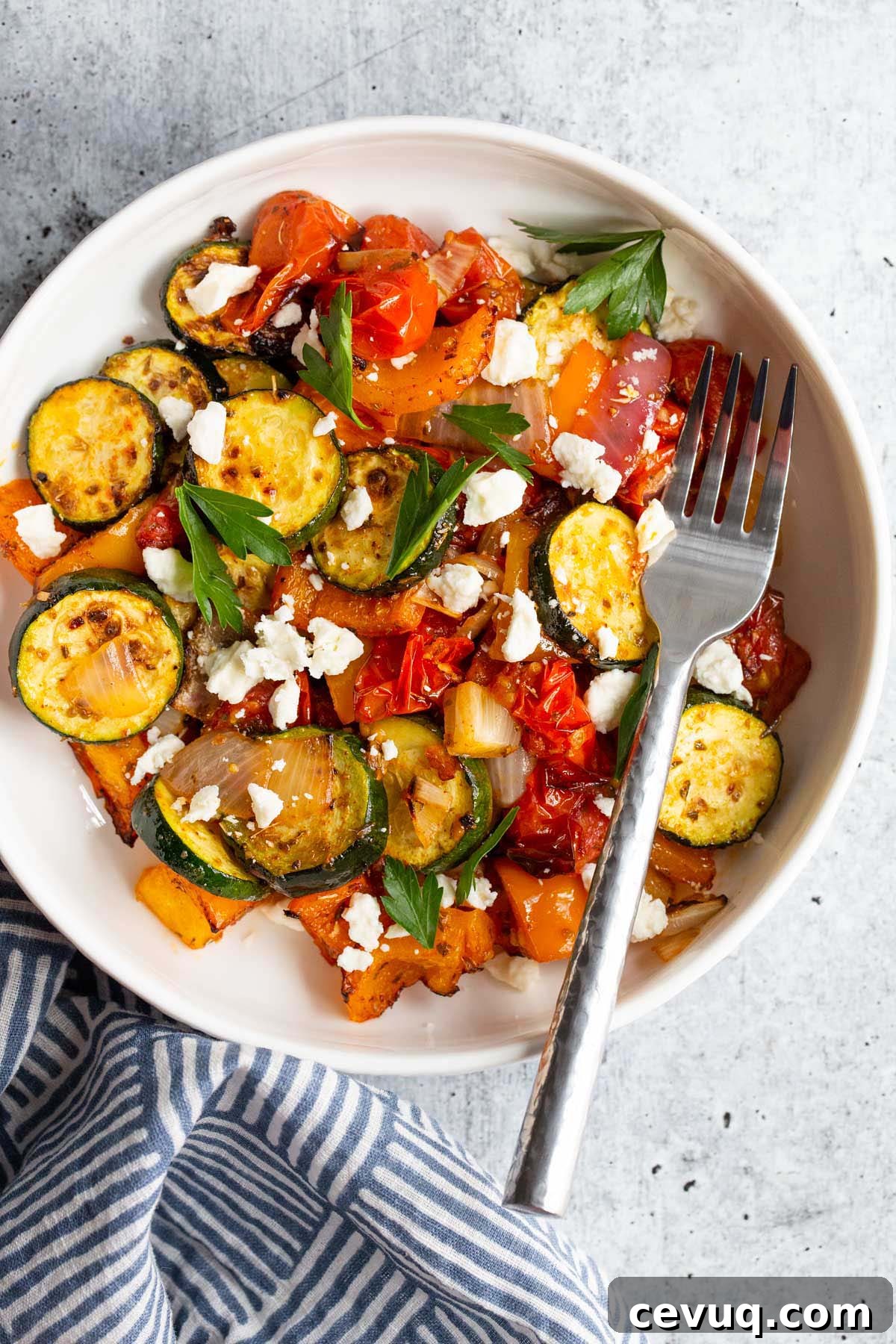 Air fried mediterranean vegetables with feta and parsley.
