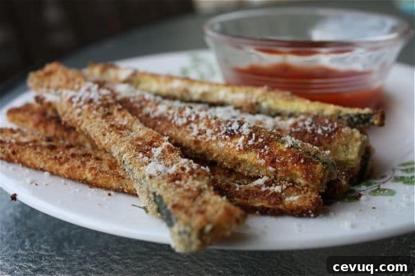 These Oven Baked Parmesan Zucchini Sticks are just as good as the fried version... if not better. Less oil, less greasy mess. Great snack or appetizer, my family loves them!