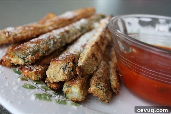 These Oven Baked Parmesan Zucchini Sticks are just as good as the fried version... if not better. Less oil, less greasy mess. Great snack or appetizer, my family loves them!