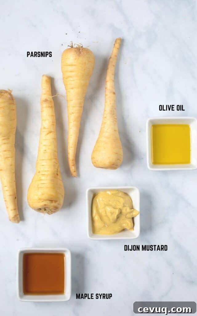 Crispy Roasted Parsnips with Honey and Thyme 3 overhead view of labeled ingredients including parsnips, olive oil, Dijon mustard, and maple syrup.