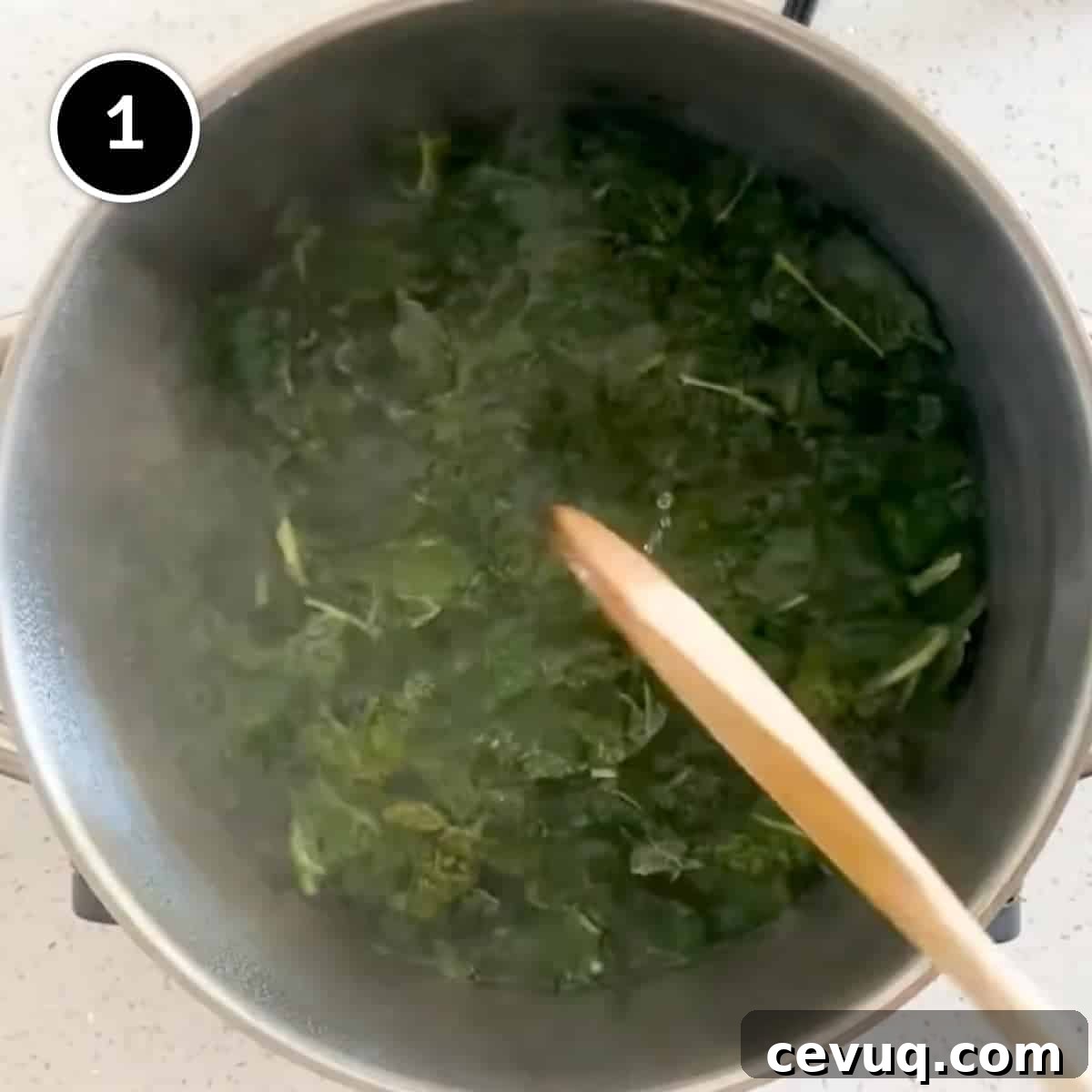 Boiling the cavolo nero in a pan of water