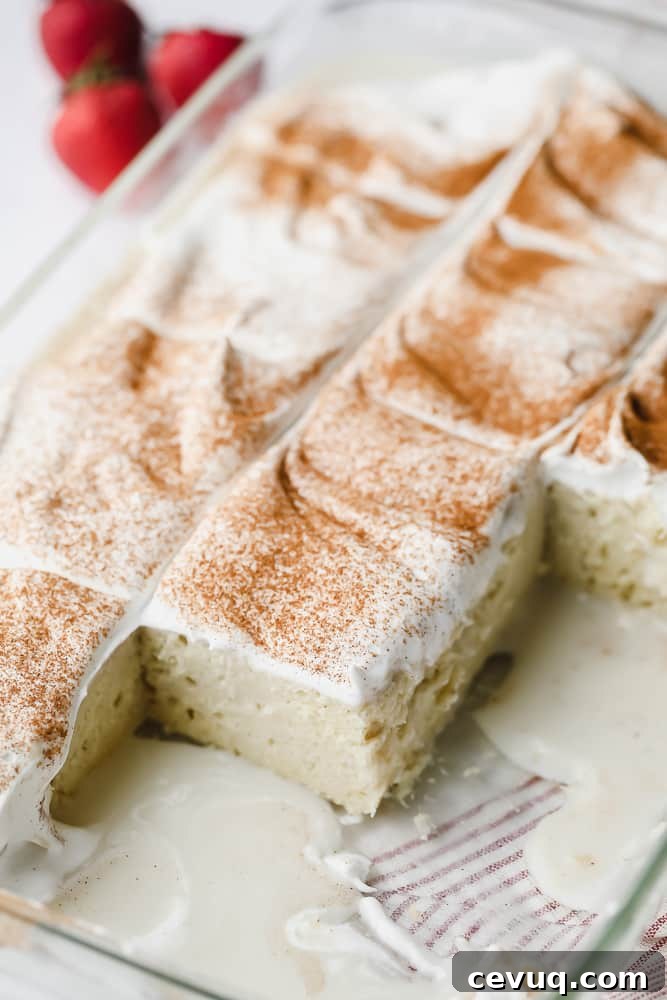 glass pan with a cake and milk mixture on the bottom
