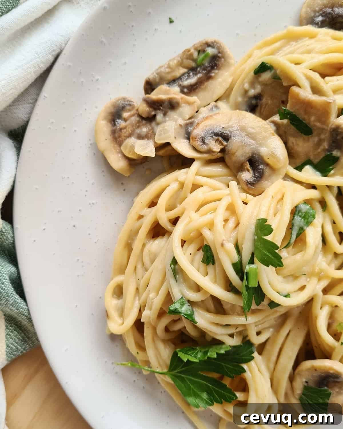 Creamy Mushroom Pasta Without Cream — Dairy-Free Recipe 2 Close up image of creamy mushroom pasta on a plate