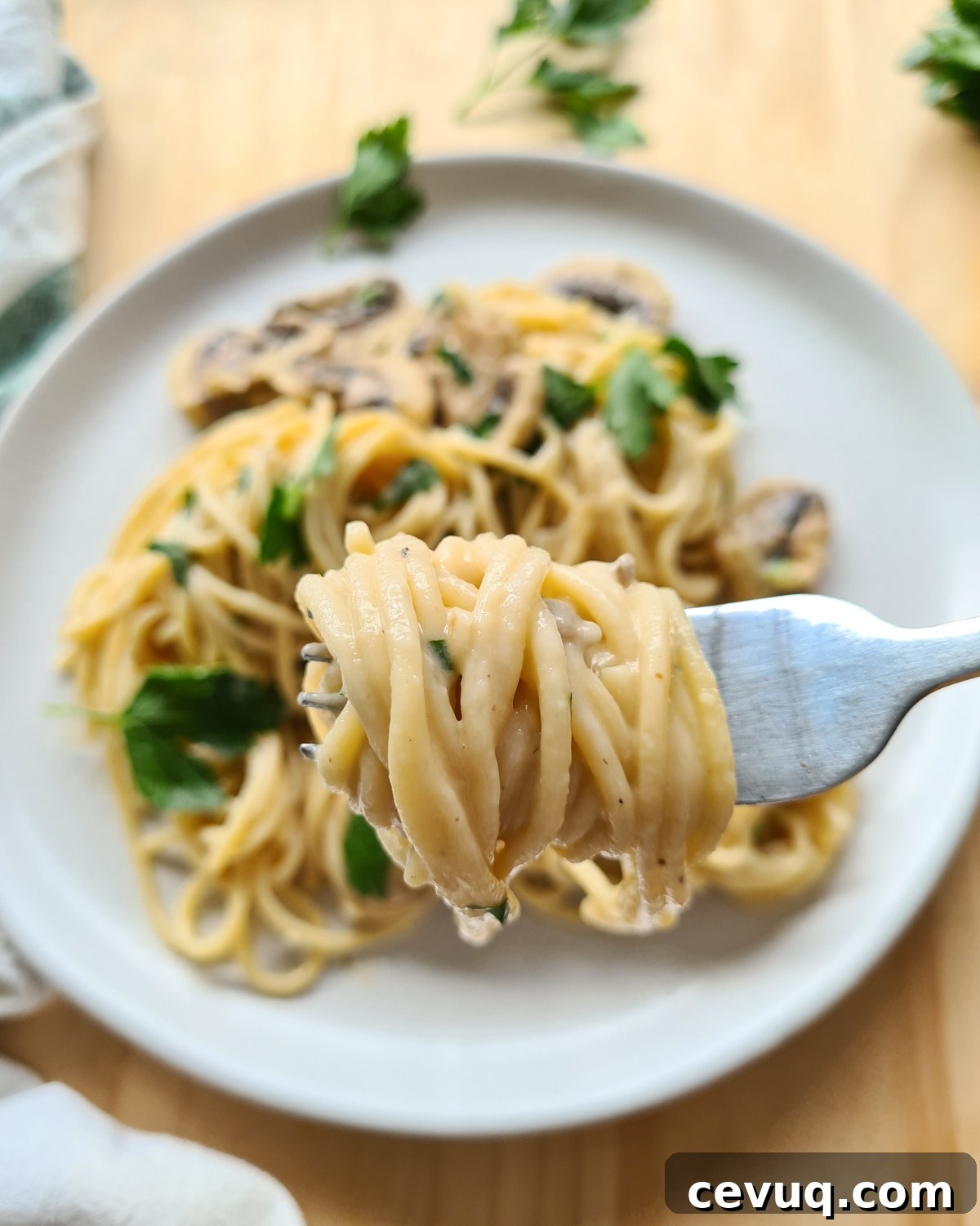 Creamy Mushroom Pasta Without Cream — Dairy-Free Recipe 15 Close up of forkful of twirled pasta