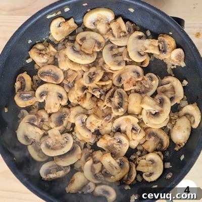Creamy Mushroom Pasta Without Cream — Dairy-Free Recipe 7 mushrooms cooked to golden brown in a skillet