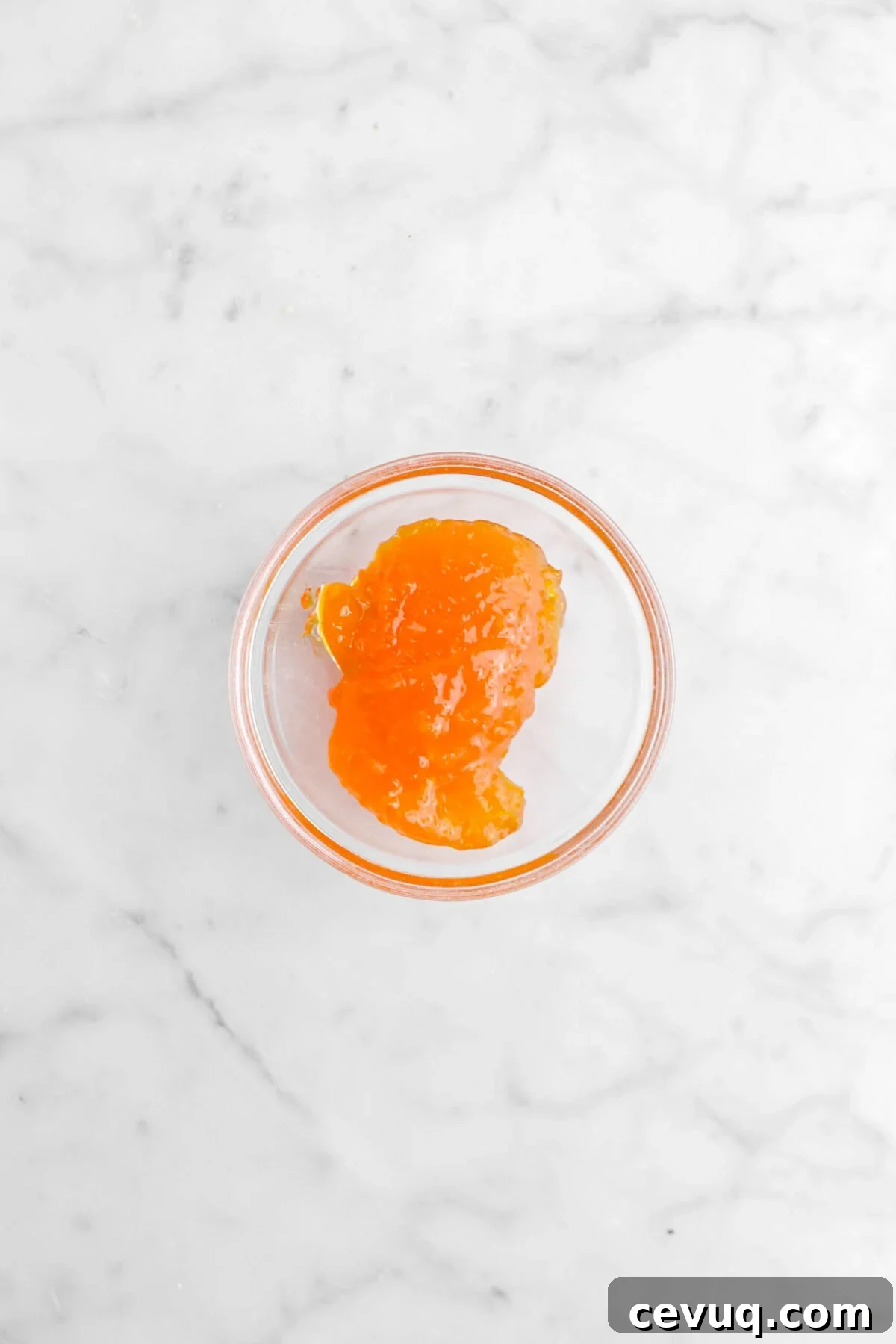 apricot jam in glass bowl