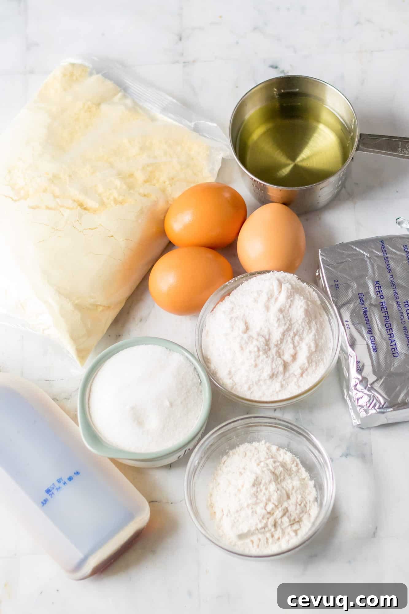 Ingredients needed to make a lemon cheesecake loaf using cake mix and instant pudding