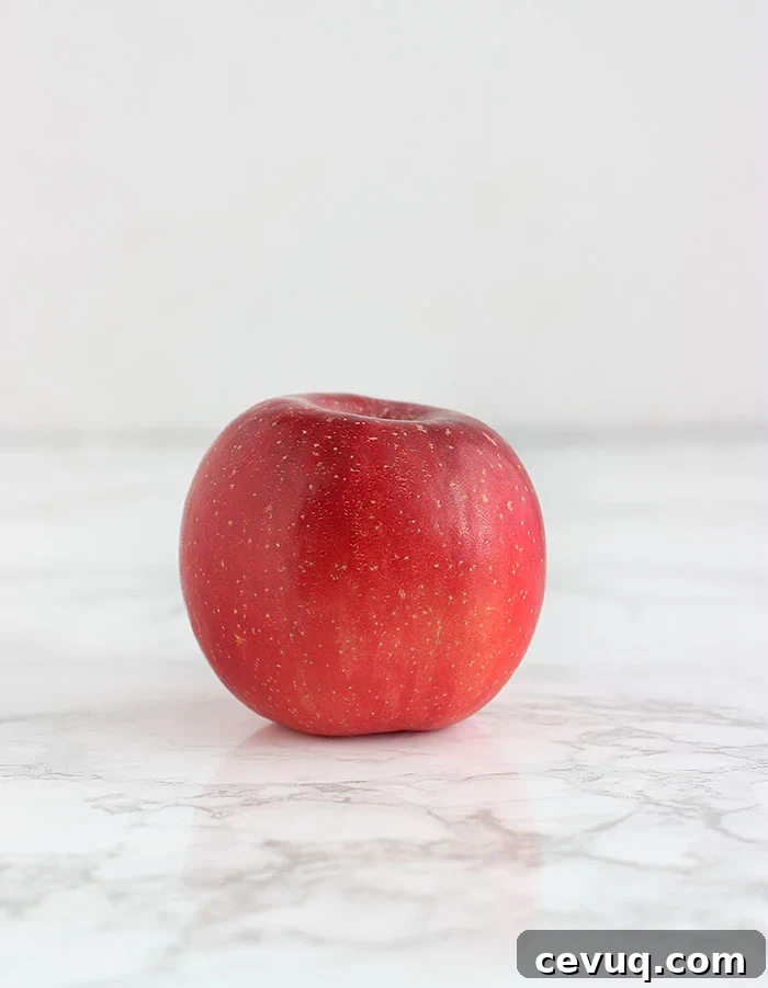 red fuji apple on a white background