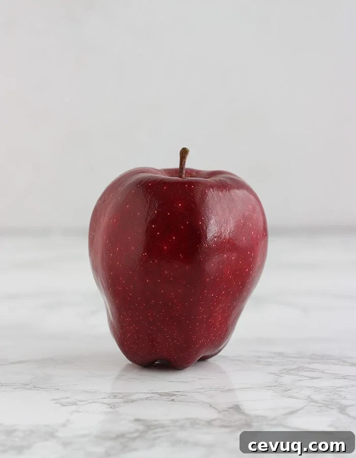 red delicious apple on a white background