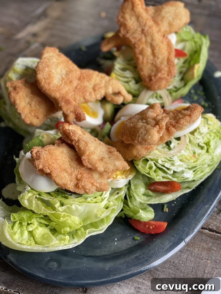 Chicken fingers on wedge salad