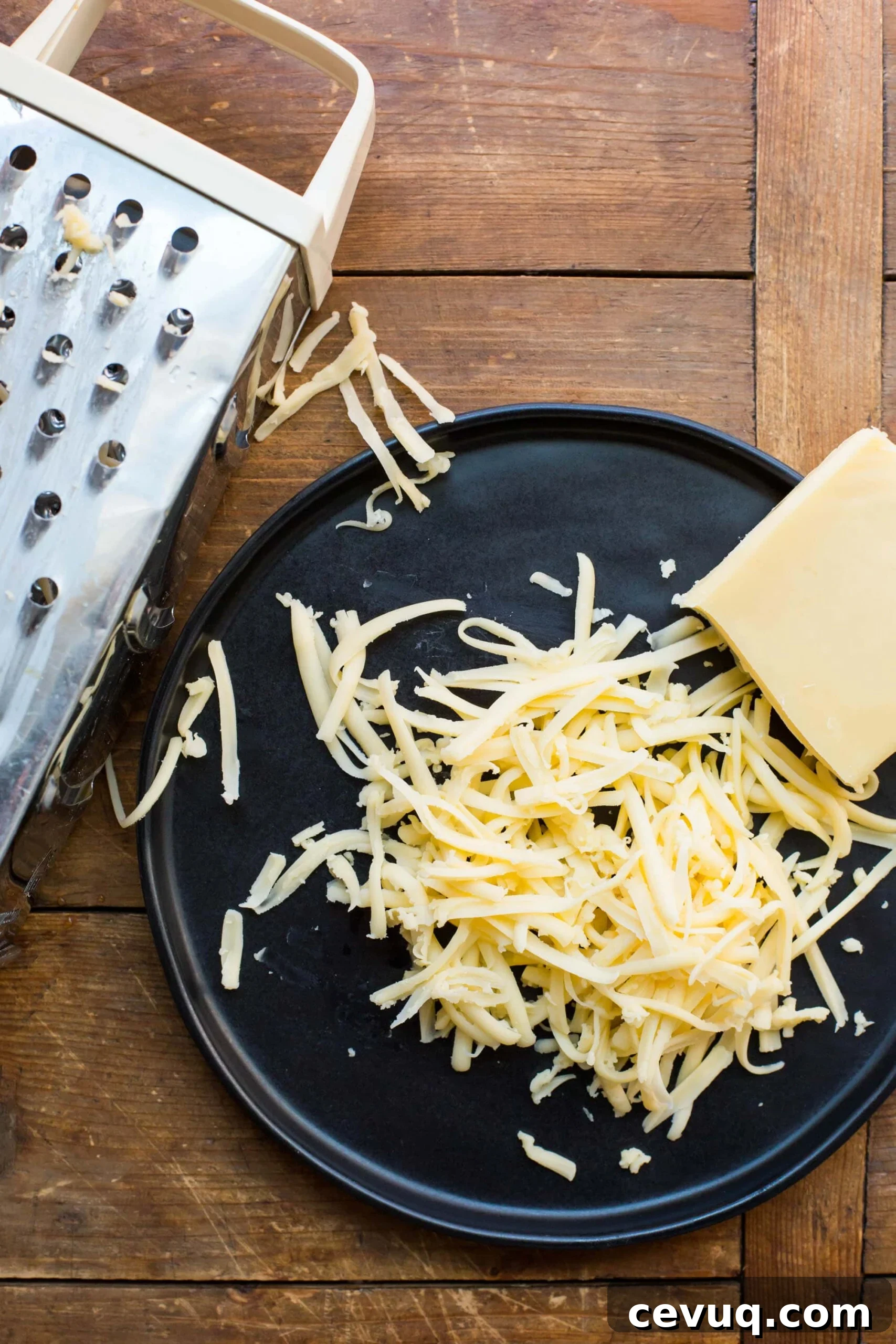 18 Delicious Recipes to Use Up Leftover Cheese 2 Grating Cheese / Katie Workman / themom100.com / Photo by Mia
