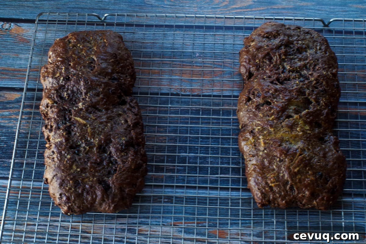 Chocolate Zucchini Biscotti Recipe: Crunchy, Moist, and Perfect for Coffee 11 2 biscotti loaves cooling on wire rack
