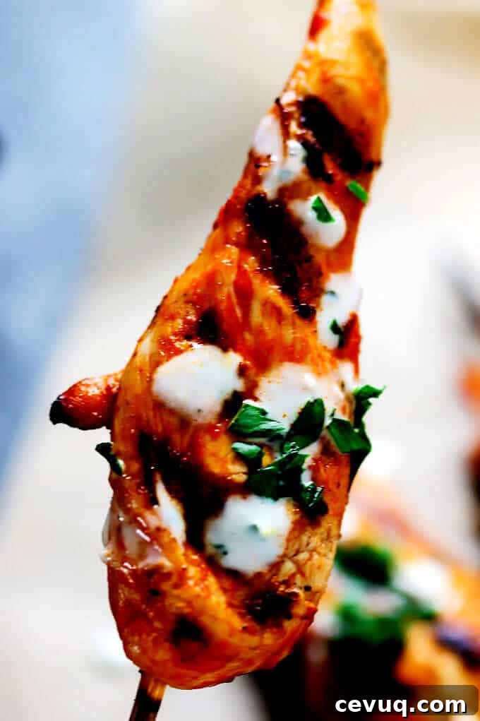 Honey Harissa Chicken Skewers with Garlic Mint Sauce - Mediterranean flavors in tasty skewers with refreshing garlic mint sauce.