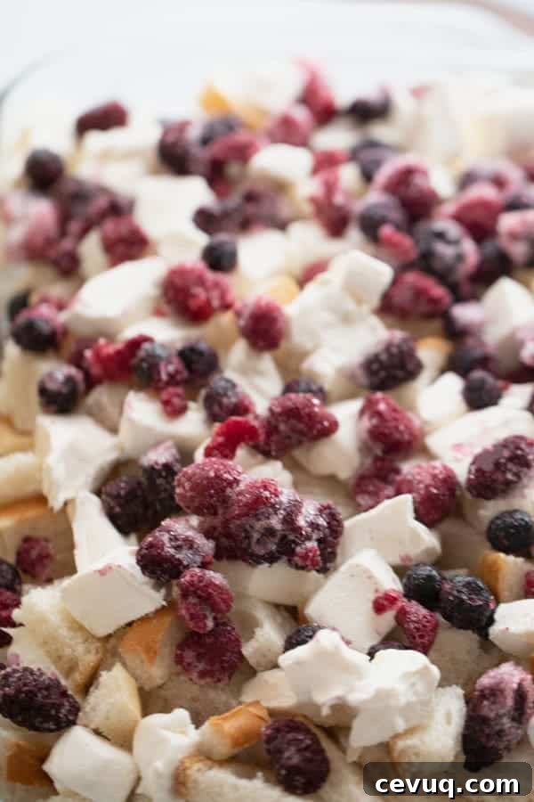 Mixed Berry Overnight French Toast Casserole ready to bake; berry french toast.