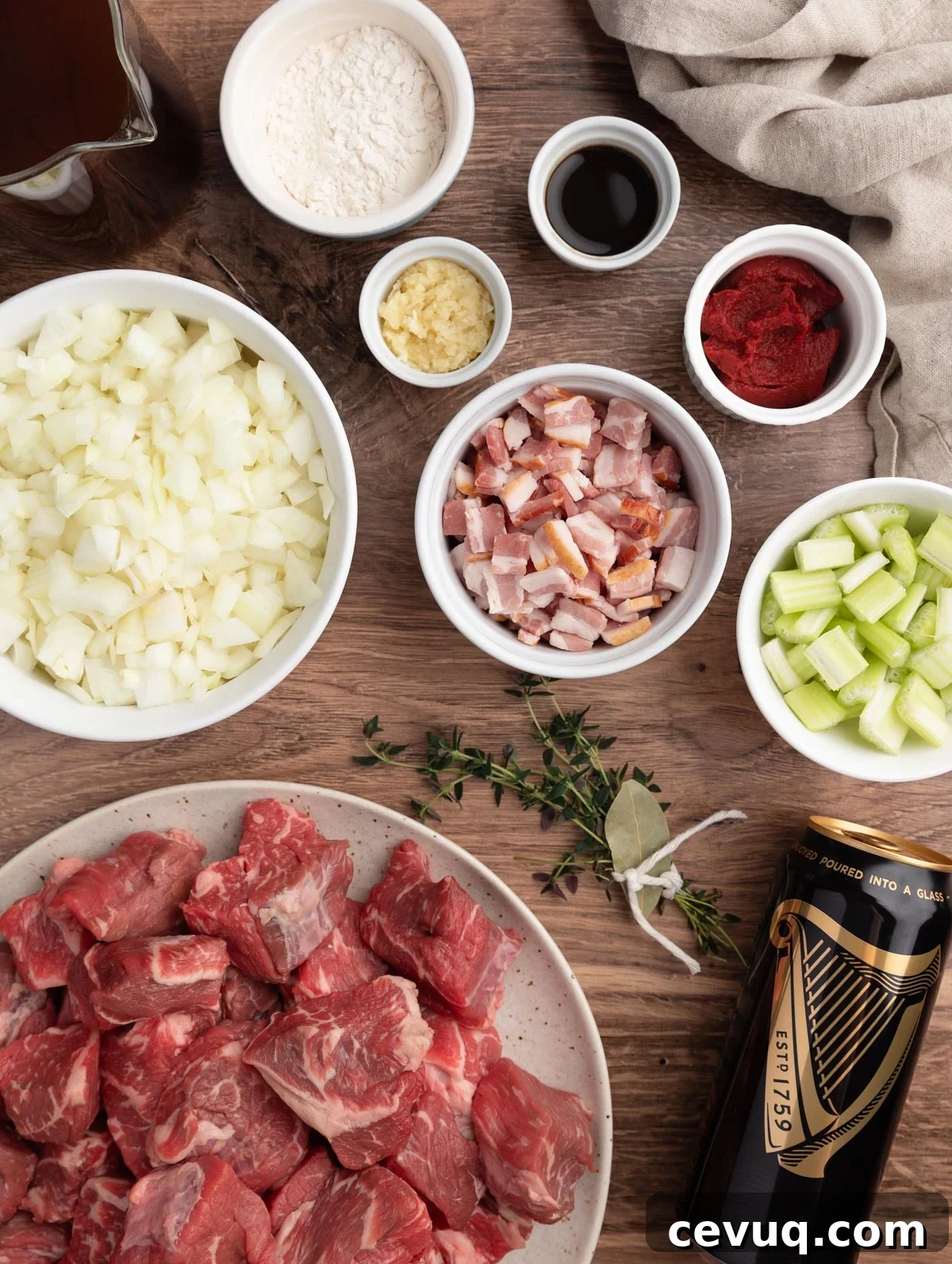 overhead photo showing the ingredients needed to make guinness beef stew in bowls