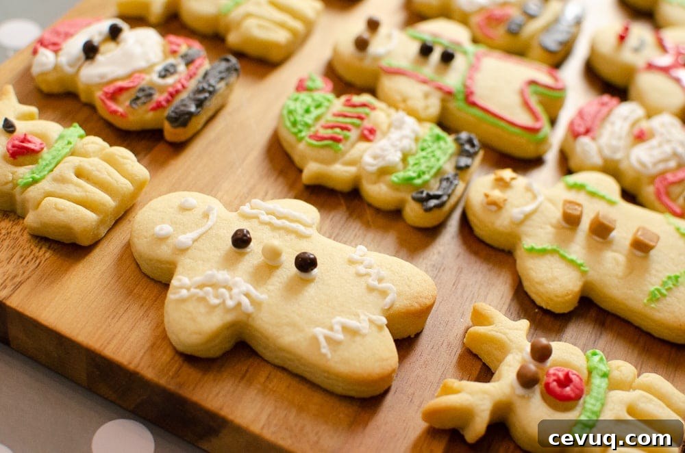 Iced Christmas Biscuits On a wooden chopping board 