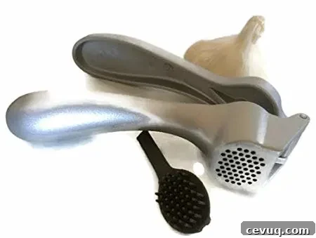 The Pampered Chef Garlic Press