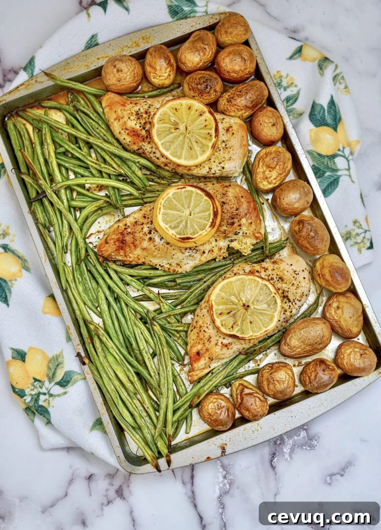 Sheet Pan Lemon Pepper Chicken by Thrifty Jinxy // FoodNouveau.com
