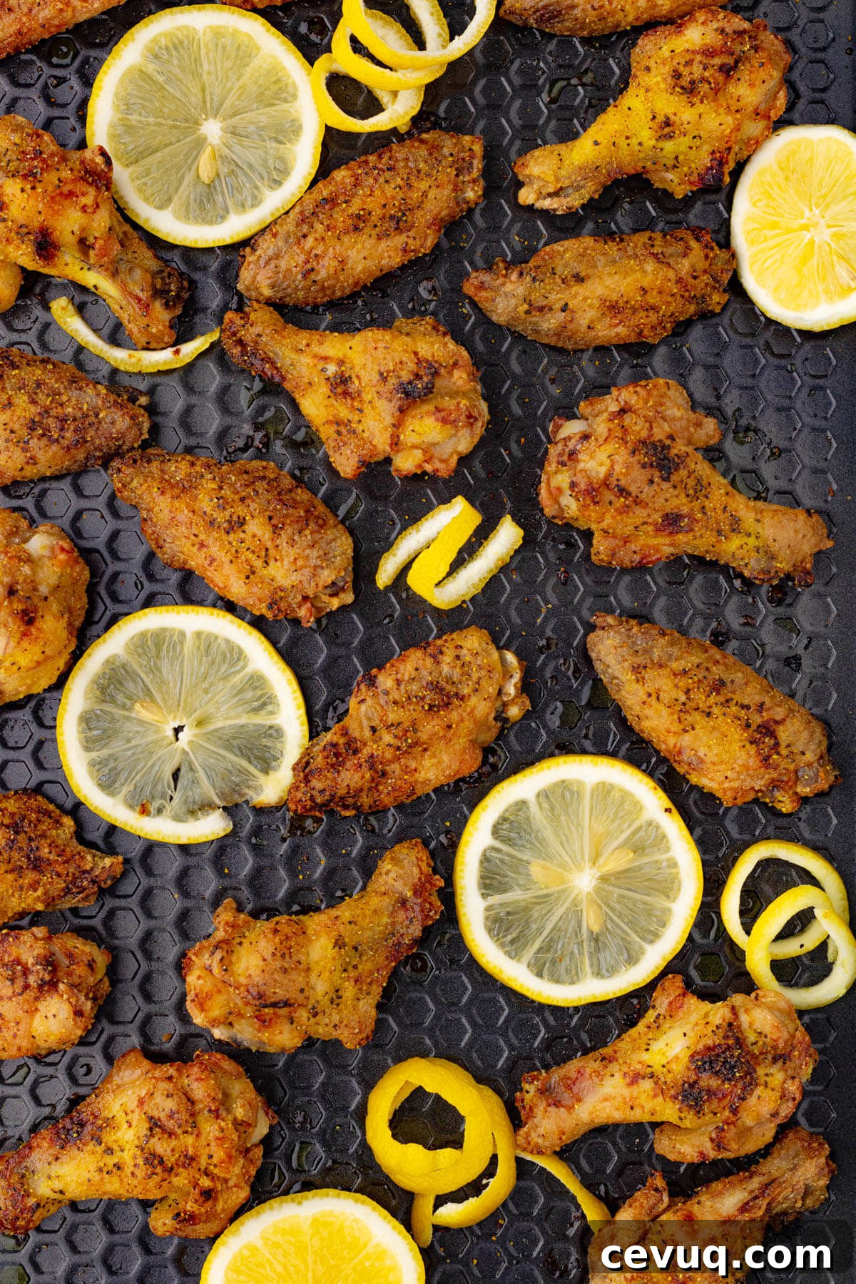 Honey Butter Baked Lemon Pepper Wings by Dish'n the Kitchen // 30 Zesty & Bright Savory Lemon Recipes // FoodNouveau.com