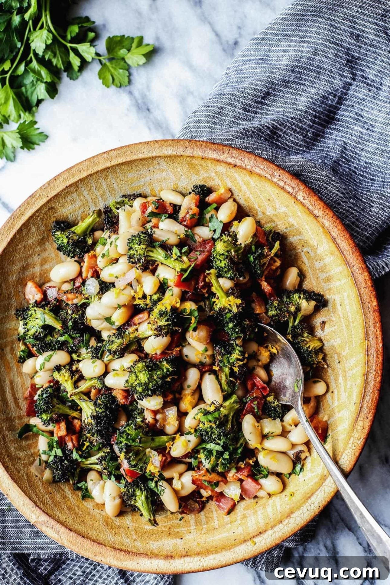 Lemon Broccoli with Beans and Bacon by A Farmgirl's Dabbles // 30 Zesty & Bright Savory Lemon Recipes // FoodNouveau.com