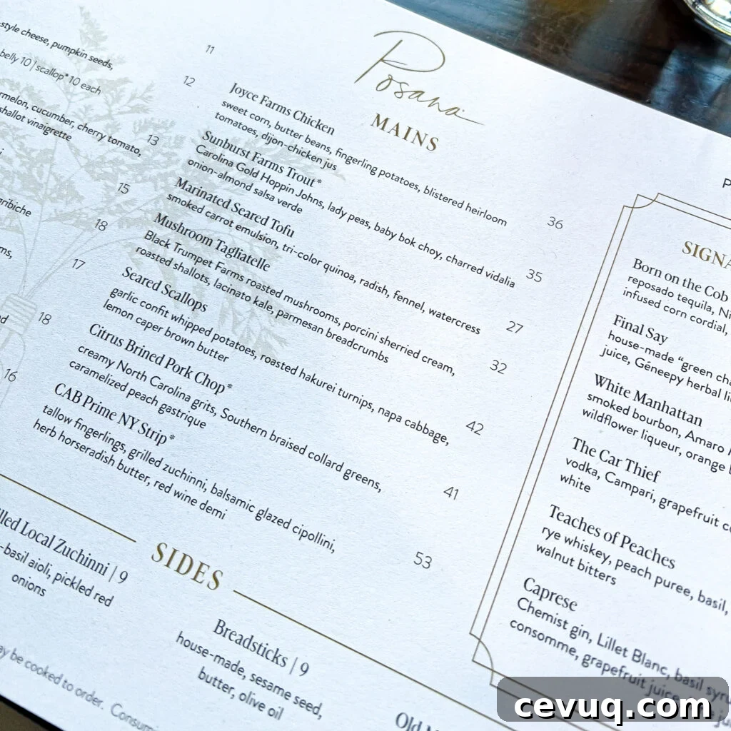 A menu showing mains like chicken, trout, and steak alongside sides and cocktails.