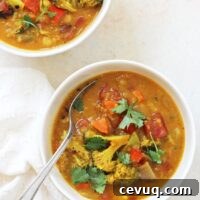 This easy turmeric quinoa vegetable soup is super comforting and cozy! Filled with flavorful spices, colorful veggies, chickpeas and coconut milk!