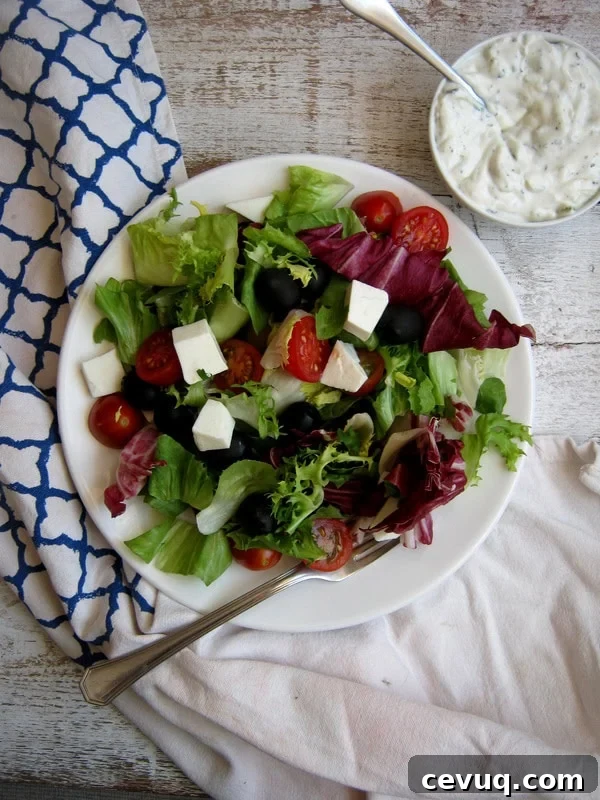 over head table setting view of the Greek Salad with Tzatziki Dressing